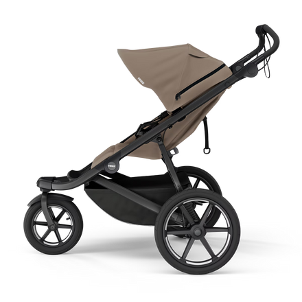 Thule Urban Glide 3 Tinted Taupe met ingebouwde beensteun en een zithoogte van 51 cm, bij De Gele Flamingo.