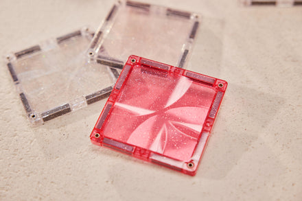Detail van de glitterafwerking op de roze Cleverclixx tegels