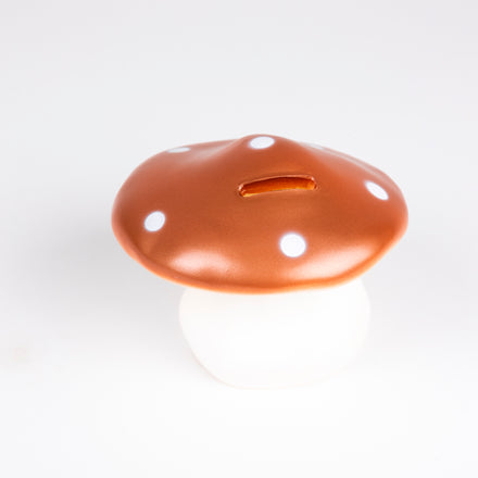 De Gele Flamingo toont de Egmont Toys Spaarpot Paddenstoel Copper van ongeveer 15 cm hoog.