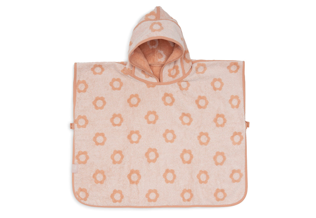 Drukknoopje opzij houdt de Jollein badponcho Jacquard Flower goed op zijn plek, De Gele Flamingo