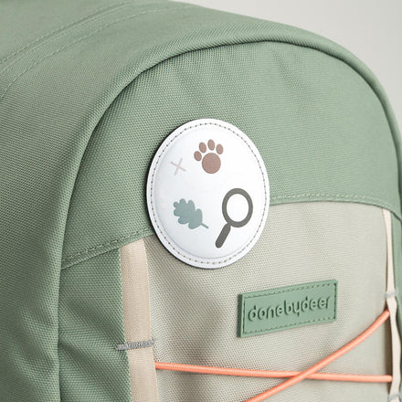 Open hoofdvak met binnenvak van de groene Done By Deer rugzak