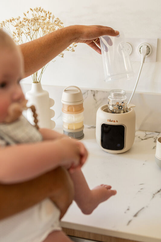 Béaba Multi Milk Flessenwarmer in Klei-Aarde met 5 programma's in 1 toestel bij De Gele Flamingo
