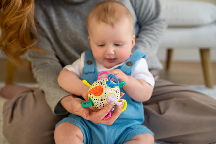 Manhattan Toys Sensorische Baby Speeltje Click Clack Colorpop