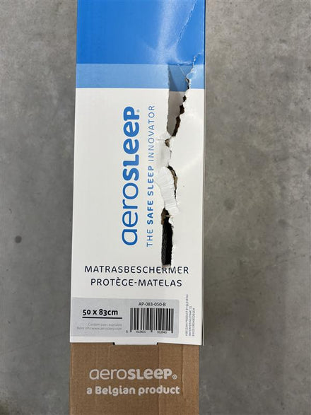 Aerosleep matrasbeschermer voor wieg en co-sleeper, foto van de beschadigde verpakking