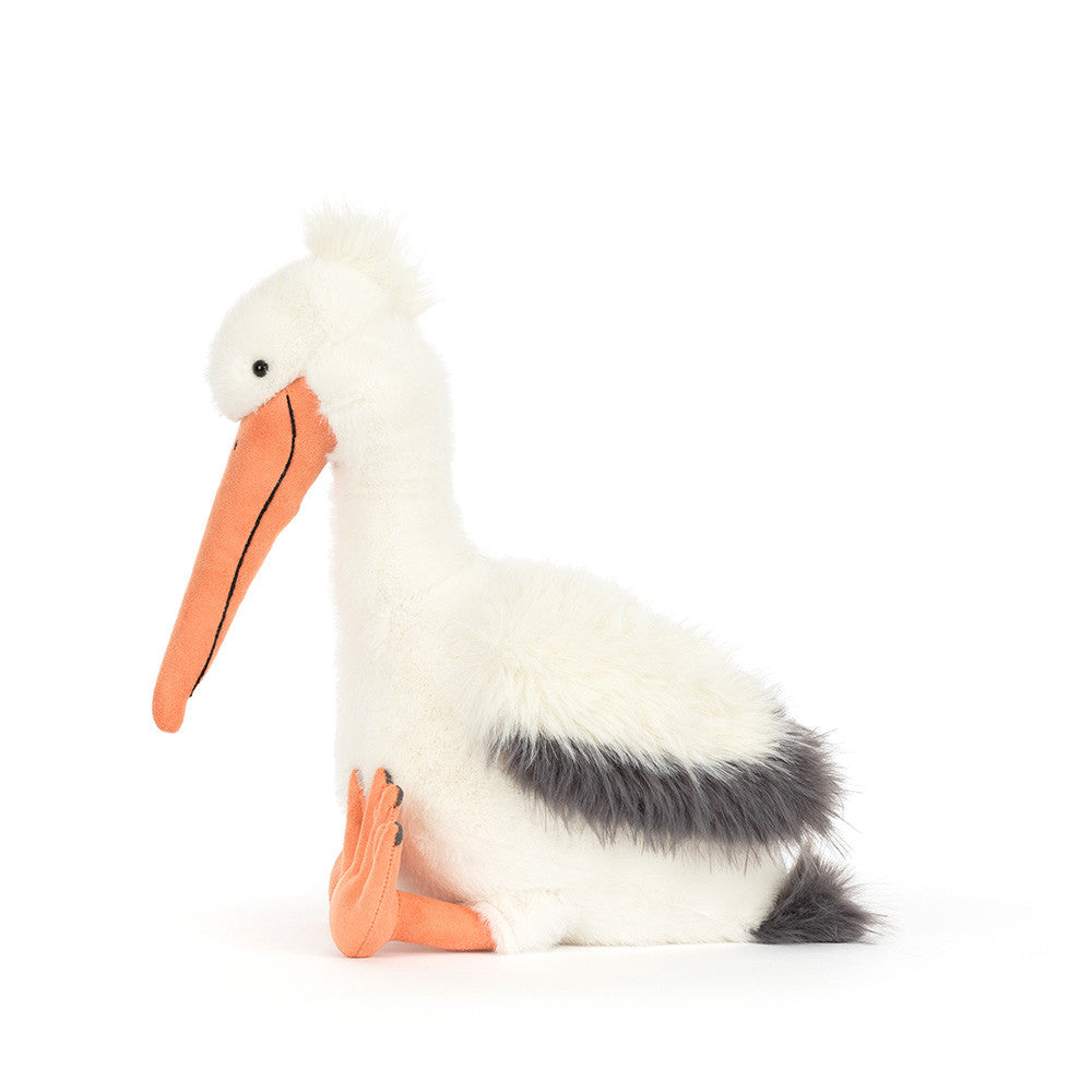 Jellycat Keli Pelican, zijaanzicht met zwarte vleugelpunten