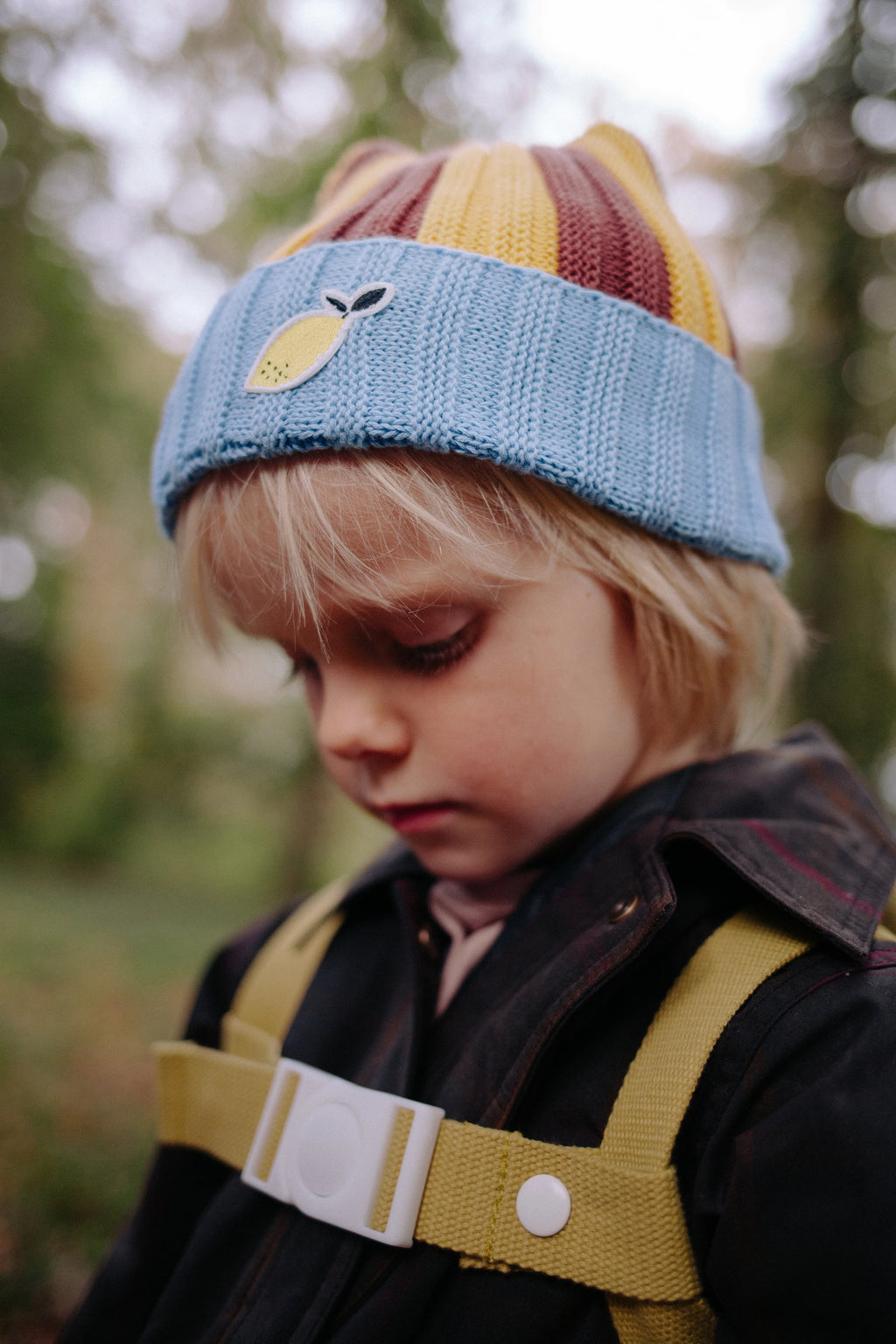 Sticky Lemon chest strap met ronde clip die kinderen zelf vast- en losmaken, te koop bij De Gele Flamingo.