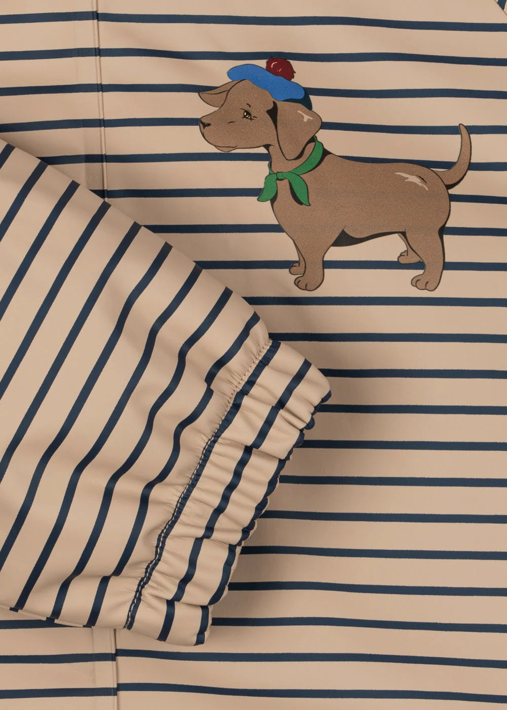 Konges Sløjd Palme Dog Regenjas Stripe La Mer met vrolijke print van hondjes, bij De Gele Flamingo