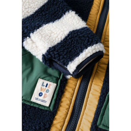 Liewood Noam Pile Jas Classic Navy Multi Mix met rits, voorzakken en duimgaten, bij De Gele Flamingo