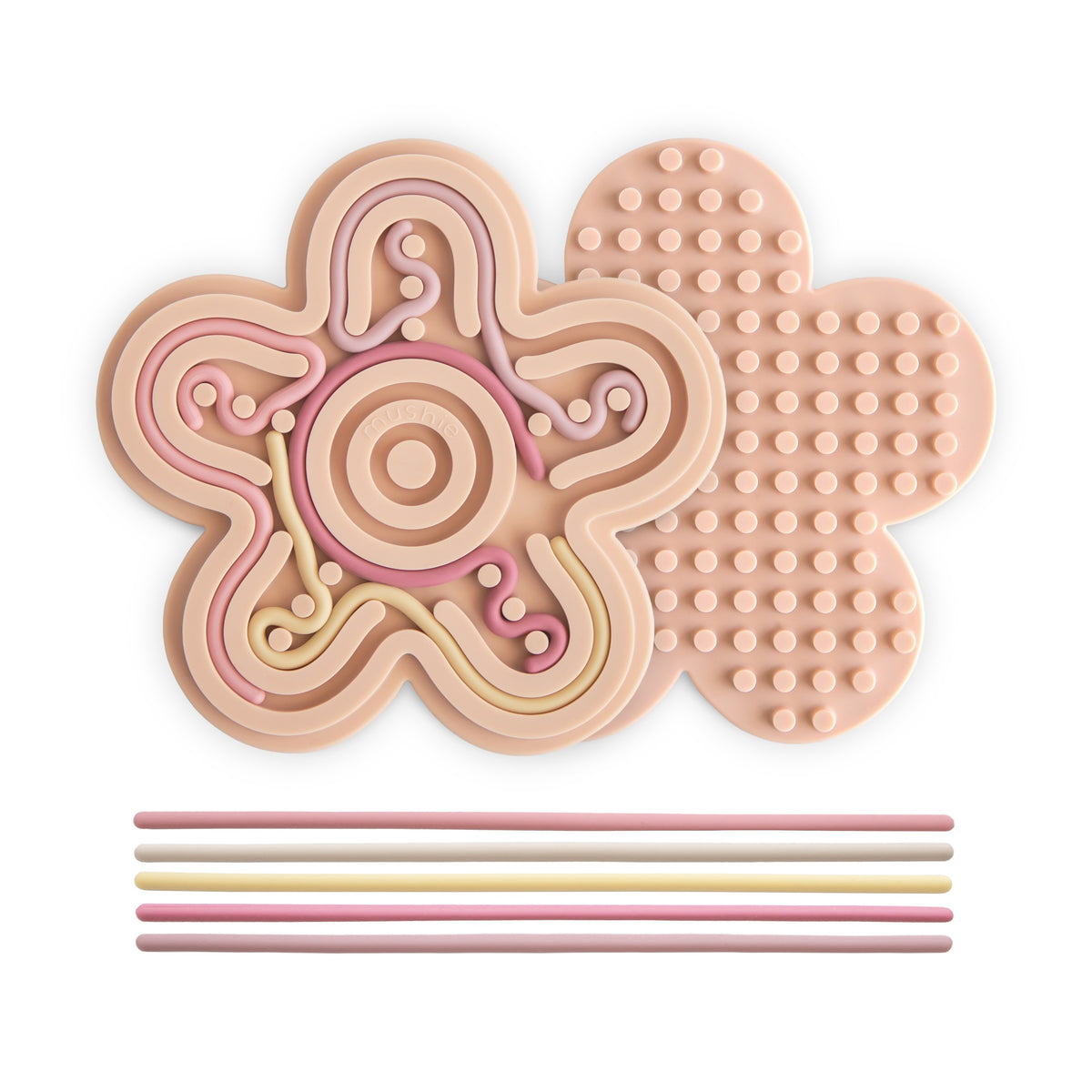 Mushie siliconen sensorisch speelgoed in pastel, dubbelzijdig speelbord bij De Gele Flamingo