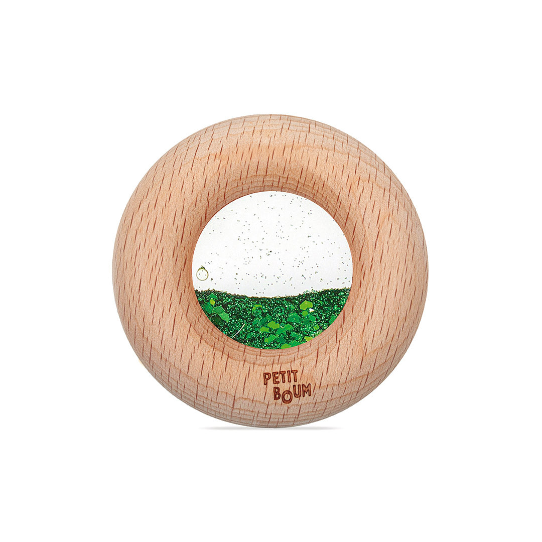 Petit Boum Sensorische Donut groen met glitters in de transparante ring, te koop bij De Gele Flamingo.