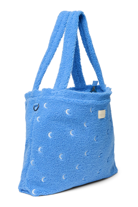 Teddy luiertas Lichtblauw Moons van Studio Noos met D-ringen voor aan de kinderwagen, bij De Gele Flamingo