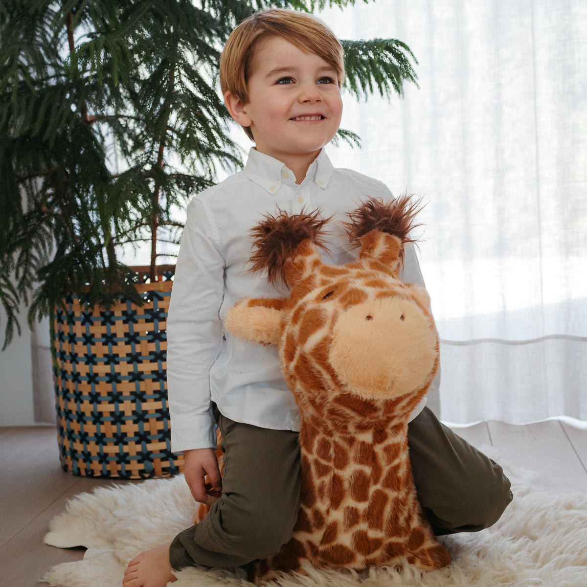 Wild & Soft Bouncy Giraf, een zacht opblaasbaar springdier, verkrijgbaar bij De Gele Flamingo